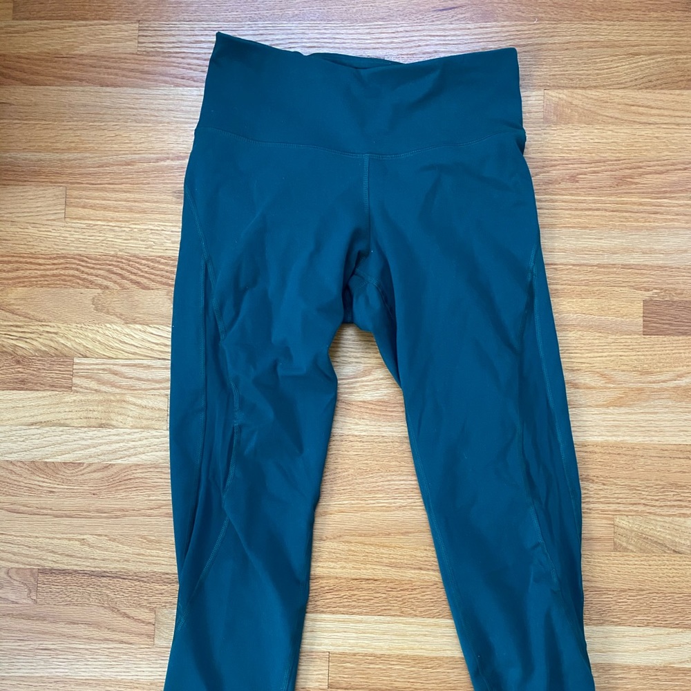 OLIVE GREEN LEGGINGS WITH MESH... SIZE M